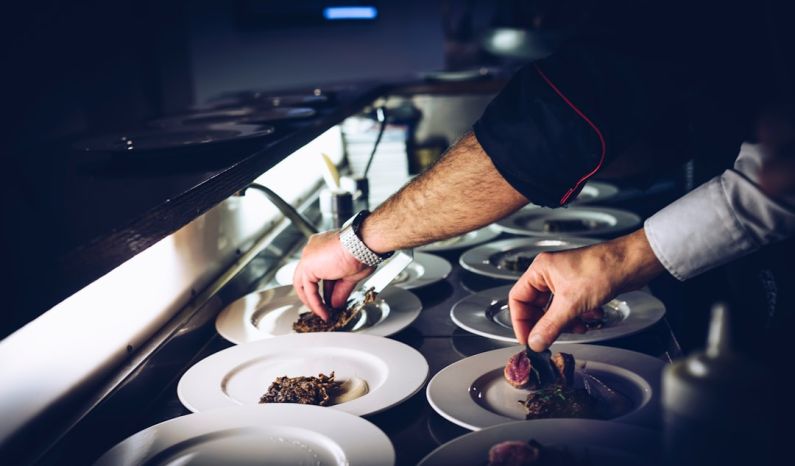 Molecular Gastronomy - person preparing cooked dish