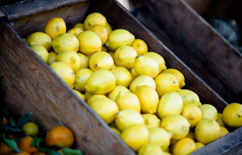 Farm-to-table Cuisine - bunch of lemons on box