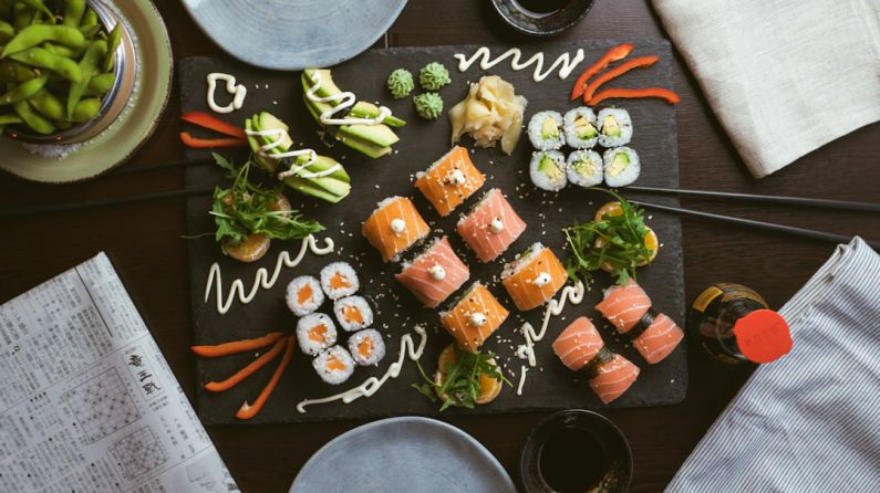 Fermentation Cuisine - sushi on black ceramic plate