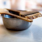 Baking Art - brown wooden fork on gray ceramic bowl