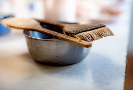 Baking Art - brown wooden fork on gray ceramic bowl