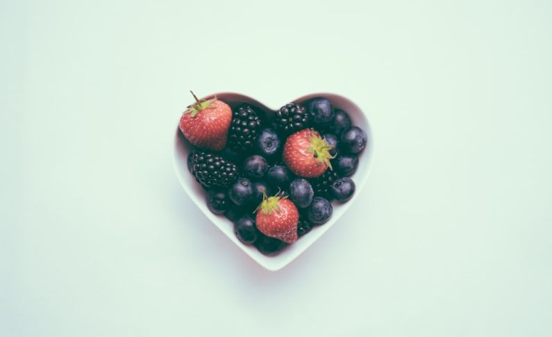 Personalized Nutrition - heart-shaped bowl with strawberries