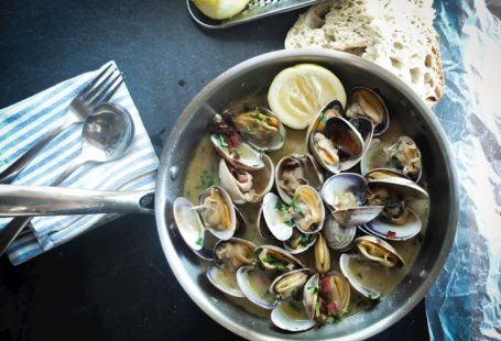 Cell-based Seafood - round silver steel bowl with scallops