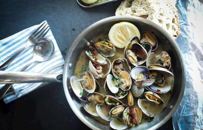 Cell-based Seafood - round silver steel bowl with scallops