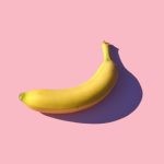 3D Food Printing - riped banana on pink surface
