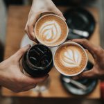 Functional Beverages - three person holding beverage cups