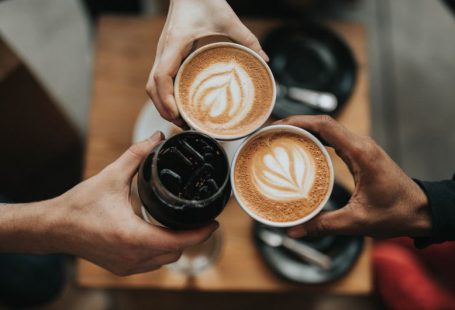 Functional Beverages - three person holding beverage cups