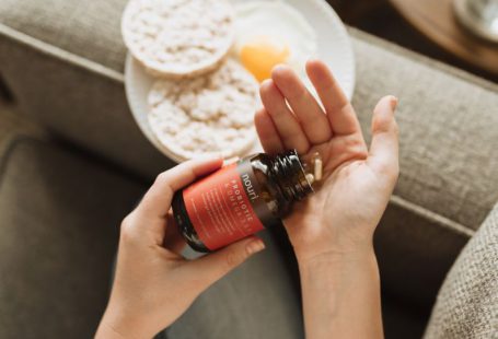 Probiotic Food - person holding red bottle