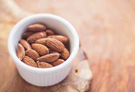 IoT Food - shallow focus photography of almonds in white ceramic bowl