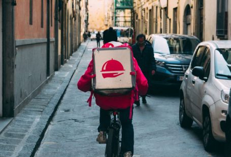 Food Delivery App - man riding a bicycle