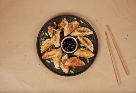 Cultured Meat Lab - a plate of food and chopsticks on a table