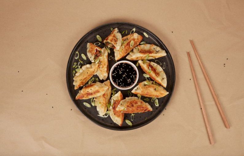 Cultured Meat Lab - a plate of food and chopsticks on a table