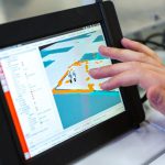 AI Farming - person holding black tablet computer