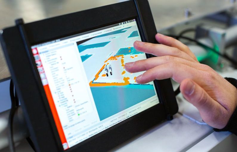 AI Farming - person holding black tablet computer